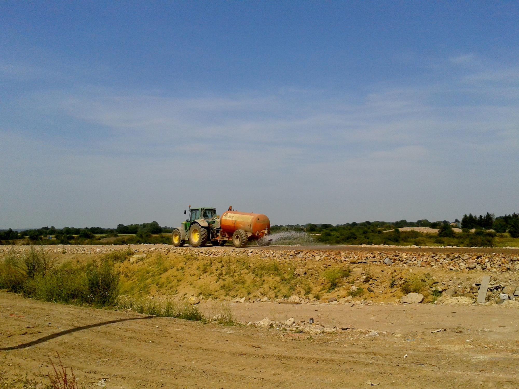 The roads are sprayed continuously with water to prevent dust Little Belhus Country Park Restoration - Rural Arisings
